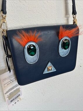 Uterque Navy Crossbody Bag with Orange Fur Accents
